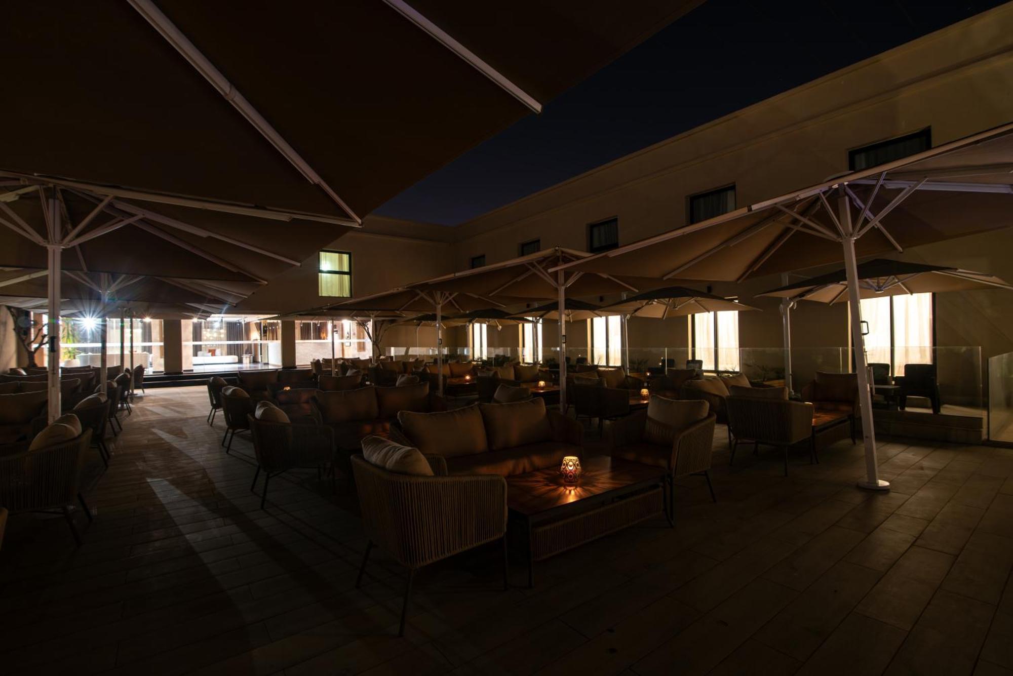 Dominium Palace Agadir Exterior foto The terrace of the restaurant